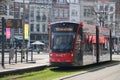 Avenio R-NET red black street car tram on line 15 on the Vijverberg in The Hague in The Netherlands Royalty Free Stock Photo