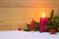 Christmas red decoration and Advent candle. Christmas card. Royalty Free Stock Photo