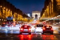 Avenue des Champs-Elysees and Arc de Triomphe at dusk, Paris. France