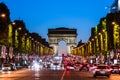 Avenue des Champs Elysees and Arc de Triomphe at night. Paris, F Royalty Free Stock Photo