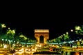 Avenue des Champs-Elysees in night lighting leading up to the Arc de Triomphe in Paris, France Royalty Free Stock Photo