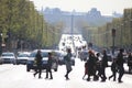 The Avenue des Champs - Elysees in Paris, France - cars, pedestrians, perspective Royalty Free Stock Photo