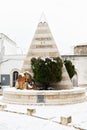 Avetrana, Italy - January 5, 2019, War Memorial, Avetrana under the snow, a day of snow in Salento, an unusual winter in Puglia