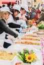 AVETRANA, ITALY - MARCH, 19, 2019. Italian Easter tradition from Salento: Tria di St. Giuseppe, the distribution of food to people