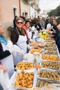 AVETRANA, ITALY - MARCH, 19, 2019. Italian Easter tradition from Salento: Tria di St. Giuseppe, the distribution of food to people