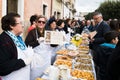 AVETRANA, ITALY - MARCH, 19, 2019. Italian Easter tradition from Salento: Tria di St. Giuseppe, the distribution of food to people