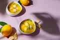 Avgolemono chicken soup with meatballs. two white bowls of soup, crackers, and lemons over your head, on a purple background with Royalty Free Stock Photo