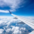 aviation as an airplane\'s wing soars through the vast, clear blue sky.