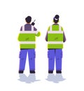aviation marshallers in uniform using walkie talkie air traffic controllers airline worker in signal vests professional