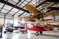 aviation museum, showcasing the history of aviation with vintage planes and artifacts