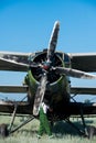 An aviation technician prepares an agricultural aviation aircraft for the next flight