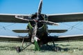 An aviation technician prepares an agricultural aviation aircraft for the next flight