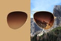 Aviator sunglasses isolated on brown and winter background with snow on the mountain tops, concept of polarized protective lenses Royalty Free Stock Photo