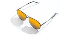 Aviator sunglasses on white background. Fashion sunglass with sunlight for summer concept. Gold gradient on mirror lens Royalty Free Stock Photo