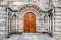 Avigliana, Italy, March 9, 2013: the carved wood door at the entrance of the Sacra of Saint Michael church.