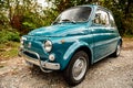 Avigliana, Italy. October 10th, 2020. Front view of classic old FIAT 500L in blue marine color parked along the road leading to