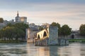 Avignon Bridge with Popes Palace and Rhone river at sunrise, Pont Saint-Benezet, Provence, France Royalty Free Stock Photo