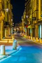 AVIGNON, FRANCE, JUNE 18, 2017: Night view of a narrow street in the center of Avignon, France Royalty Free Stock Photo