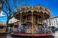 French old-fashioned style carousel with stairs at Place de Horloge in Avignon France Royalty Free Stock Photo