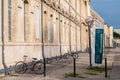 Avignon, Vaucluse, France - Historical building facade with a message flag about ecologic renovation payed by the French
