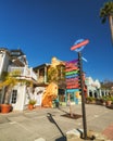 Avila Beach city promenade filled with restaurants, shops, patios, benches, and art Royalty Free Stock Photo