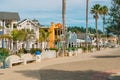 Avila Beach city promenade filled with restaurants, shops, patios, benches, and art Royalty Free Stock Photo