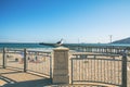 Large wide sandy beach of Avila Beach City and Avila Beach pier, California