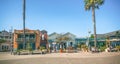 Avila Beach city promenade filled with restaurants, shops, patios, benches, and art Royalty Free Stock Photo