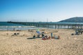 The Avila Beach Pier extends into the ocean from the Avila Beach city Promenade Royalty Free Stock Photo