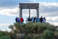 Avila, Spain - September 9, 2017: A group of tourists at the Four Post, made famous by Santa Teresa, is outside the walled city of Royalty Free Stock Photo