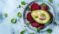 Avocado and beet salad on a light blue background Royalty Free Stock Photo