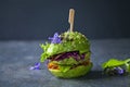 Avocado burger with green patty