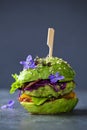 Avocado burger with green patty