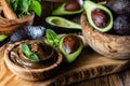 Avocado chocolate mousse in olive wooden bowl Royalty Free Stock Photo