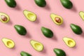 Avocado colorful pattern on a pastel pink background. Summer concept