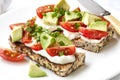 Avocado Cream Cheese and Tomatoes on Wholewheat Toast