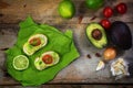 Avocado cream or guacamole on baguette canapes and ingredients l