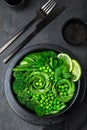avocado, cucumber, broccoli, asparagus and sweet peas salad, fresh green vegan detox lunch bowl