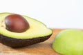 Avocado fruit on wood