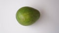 Fruit image: Green avocado on a white background Royalty Free Stock Photo