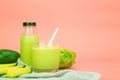 Avocado and green cos salad blended in a glass and bottle, healthy drinking water. horizontal photo Royalty Free Stock Photo