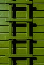 Avocado green painted exterior of wood house and trellis Royalty Free Stock Photo