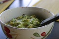 Avocado Guacamole on molcajete real Mexican traditional procedure Royalty Free Stock Photo