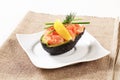 Avocado half stuffed with cured salmon Royalty Free Stock Photo