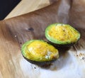 Avocado halves baked with eggs