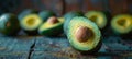 Avocado Halves on Wooden Table