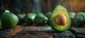 Avocado Halves on Wooden Table