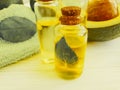Avocado oil freshness extract wooden background vitamin health Royalty Free Stock Photo