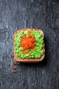 Avocado and red caviar sandwich Royalty Free Stock Photo