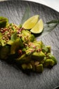 Avocado salad with fresh cucumber almond, close-up